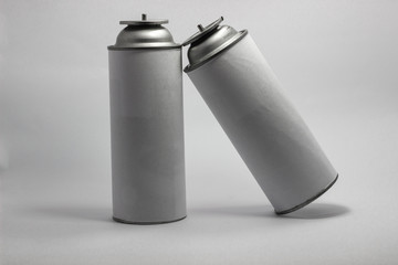 White portable tourist gas cylinder for burners with a white background.