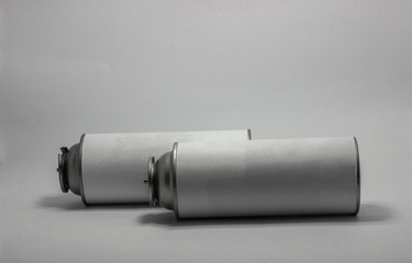 White portable tourist gas cylinder for burners with a white background.
