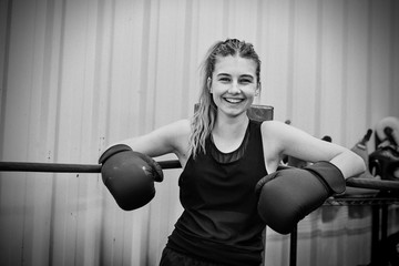 young female keeping fit boxing