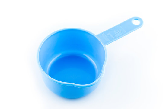 measuring spoon of plastic on white background.