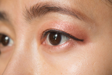 Fototapeta premium Asian women eyes staring at a distance object, with selective focus