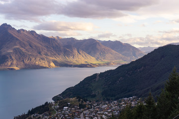 Fototapeta na wymiar Looking down at Queenstown with beautiful lake from top of Ben Lomond mountain