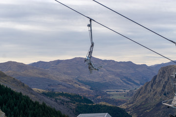 The lifts for which are going up and down the mountain