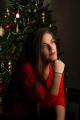 Christmas spirit with a beautiful woman thinking of her love