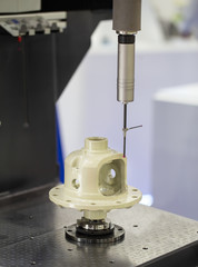 CMM Coordinate Measuring Robotic Machine measuring dimension on workpiece