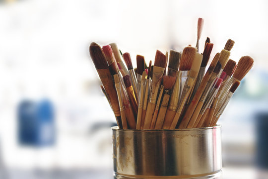 Artist Paint Brushes. Used kit paint brushes in can. Close-up. Great art background.