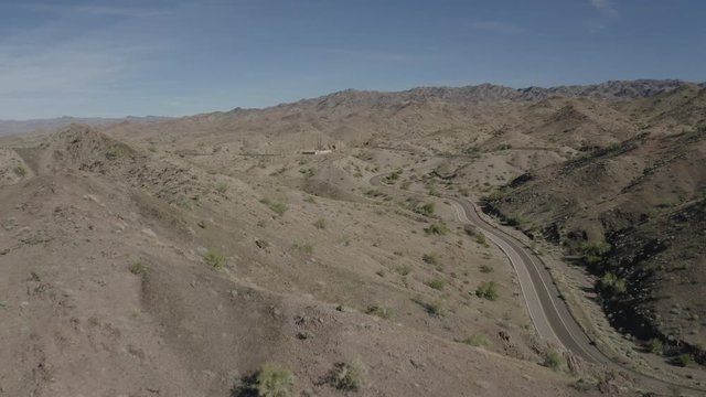 Aerial Drone View of Colorado river close to Parker Dam on a bright sunny day showing Arizona and California