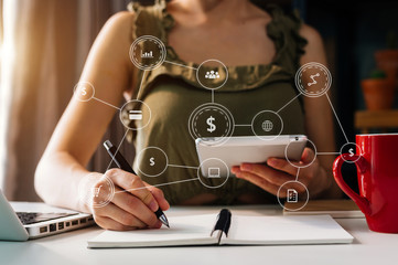 Businesswoman hand working digital marketing media in virtual screen with mobile phone and modern...