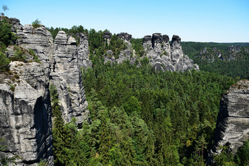 Fototapeta na wymiar Bastai rock formation (Saxon Switzerland) in summer. Germany, Europe