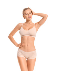 Fototapeta premium Beautiful young woman in underwear on white background
