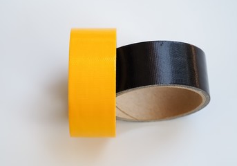 plastic bottle caps isolated, Set of color yellow black rolls scotch tape- sticky tape on gray...