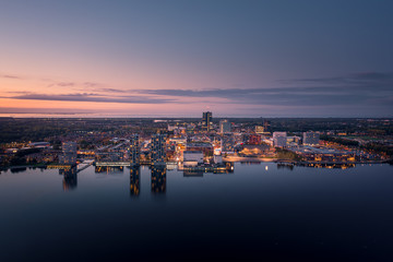 Almere city center illuminated at dusk. Aerial view.
