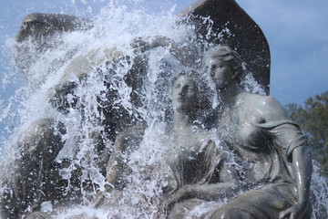 Statues with water pouring on them