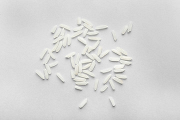 Raw rice on white background