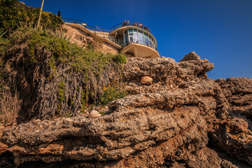 Balcon de Europa in Nerja on a sunny day. Lookout platform on the Spanish Mediterranean coast with...
