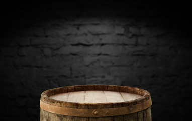 Fototapeta premium Wood table in front of rustic brick wall blur background with empty copy space on the table for product display mockup. Retro design montage presentation.