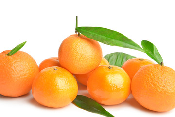 Sweet tangerines on white background
