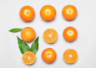Sweet tangerines on white background