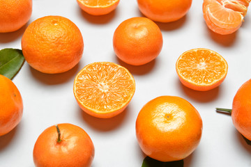 Sweet tangerines on white background