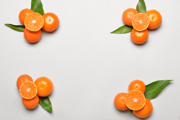 Sweet tangerines on white background