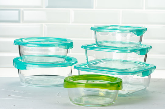 Set of plastic boxes kitchen ware on kitchen counter
