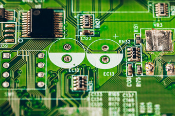 Green circuit board of a computer close up