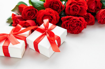 Red roses and gift boxes