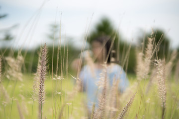young cute Japanese Asian hipster girl travelling at beautiful sky  mountains scenery park hiking garden views at Kanchanaburi Thailand guiding idea for female backpacker woman women backpacking