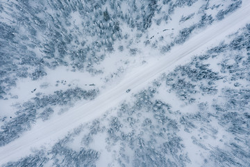 Top view a car stands on a winter road