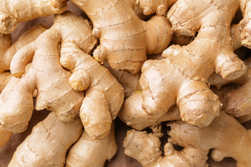 Fresh raw ginger as background