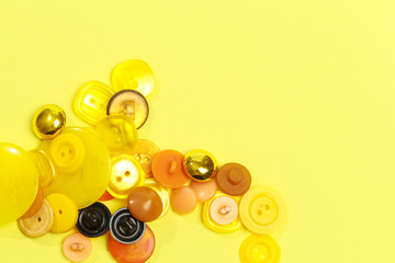 collection of various colored buttons on colored background