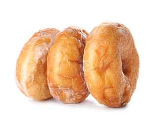 Sweet tasty donuts on white background