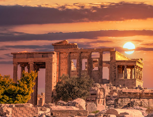Athens Acropolis Greece, Caryatids statues standing on Erechtheum ancient temple under dramatic magic hour sky