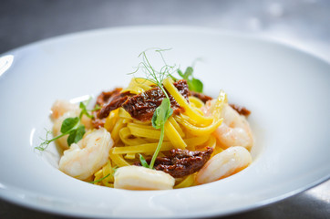 delicious italian pasta with fresh shrimps & dried tomatoes