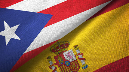 Fototapeta premium Puerto Rico and Spain two flags textile cloth, fabric texture