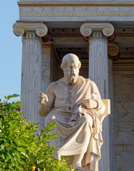 Plato the ancient greek philosopher in front of the national academy neoclassical building, Athens...