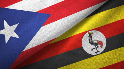 Fototapeta premium Puerto Rico and Uganda two flags textile cloth, fabric texture