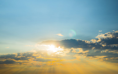 Sun and clouds at sunset