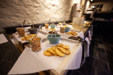 bar nuts and snacks about to be served in fancy restaurant