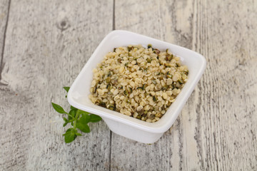 Peeled hemp seeds in the bowl
