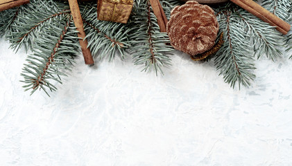 Christmas creative background border, gold color, cones, branches, place for text