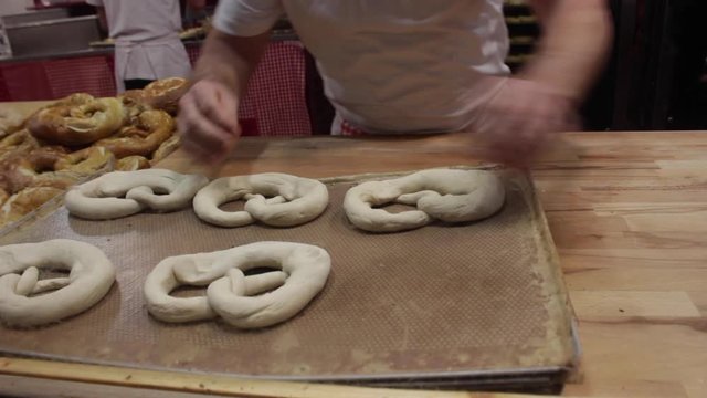 Milan, Italy,  handicraft fair, making brezl, pretzel