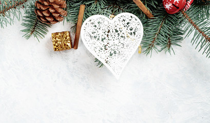 Fototapeta na wymiar Christmas toy heart on a white background, Christmas background, minimalism