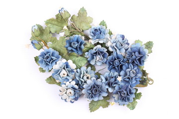Blue colorful textile rose on white background