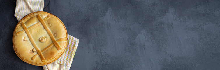 Empanada Gallega, Galician pie, typically filled with fish or meat with red or green peppers. Popular dish in Spanish cuisine.