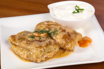 Homemade stuffed cabbage with cream