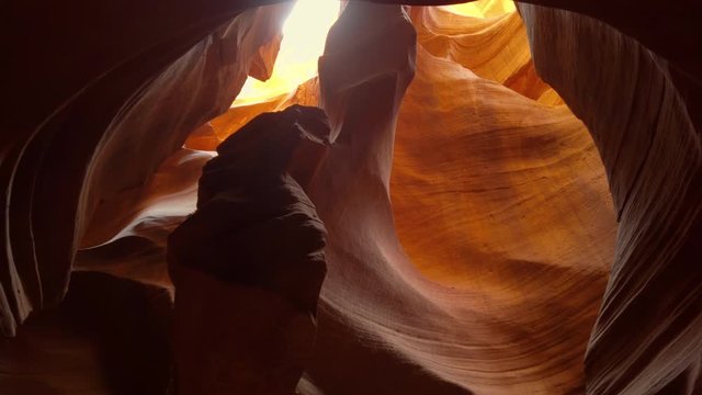 Antelope Canyon, the most photographed slot canyon in the American Southwest. It is located on Navajo land near Page, Arizona. Gimbal warp rotation cinematic legal Rec.709 ProRes 422 4K