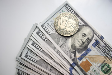 Dollars on the table with a Coin 