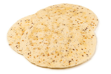 Pitta bread with seeds isolated on white