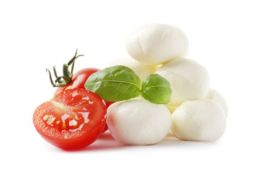 Mozzarella with tomatoes and basil isolated on white background. Top view